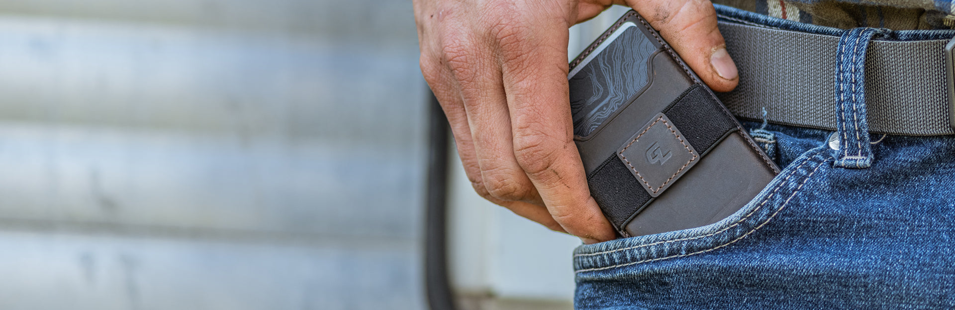 man with groove wallet in pocket