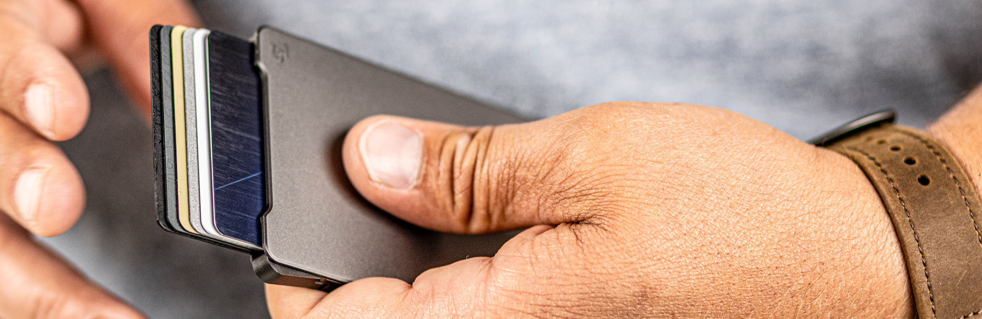 cards fanned out of groove wallet