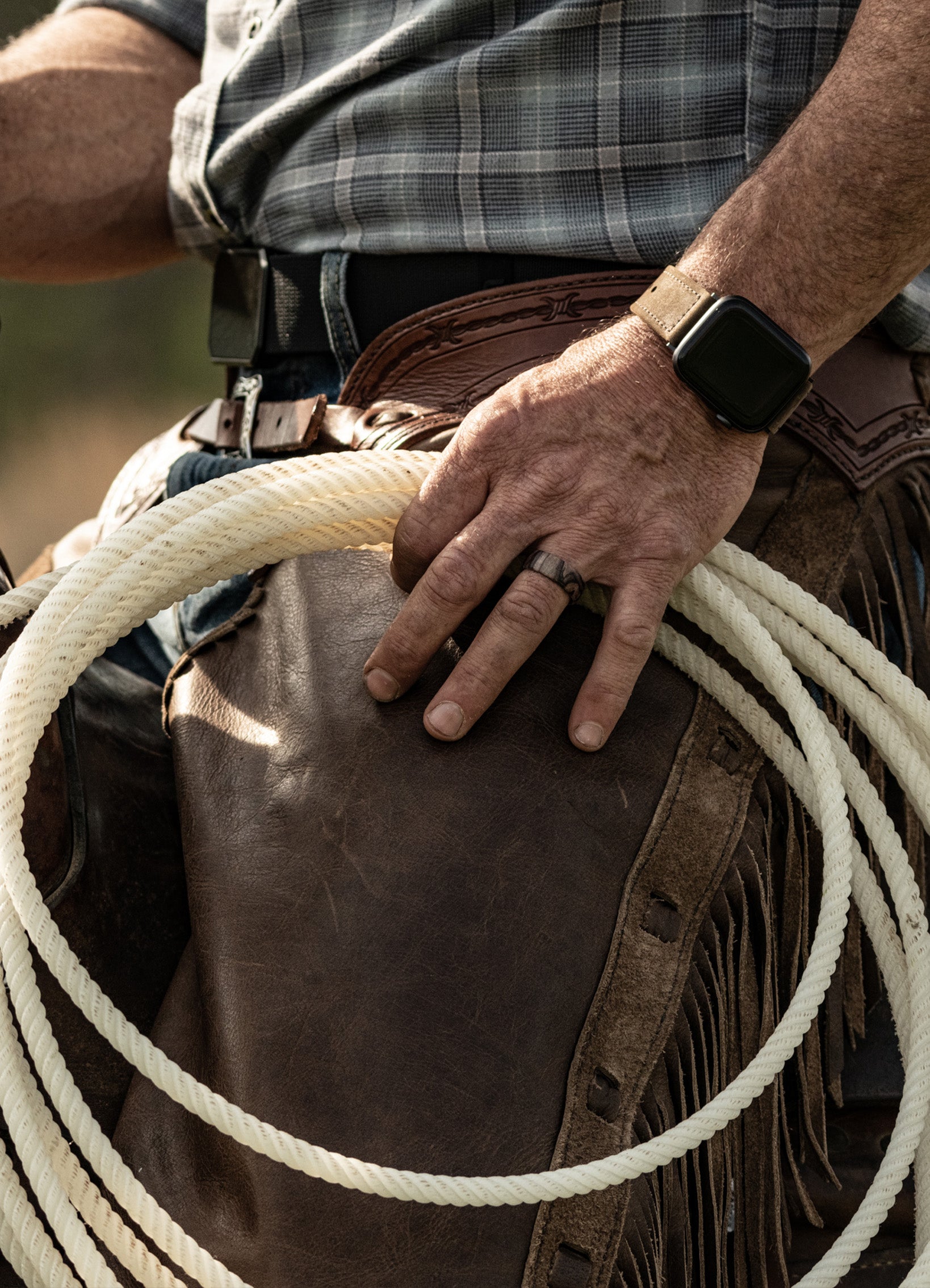cowboy holding a lasso wearing Groove Life Nomad rings