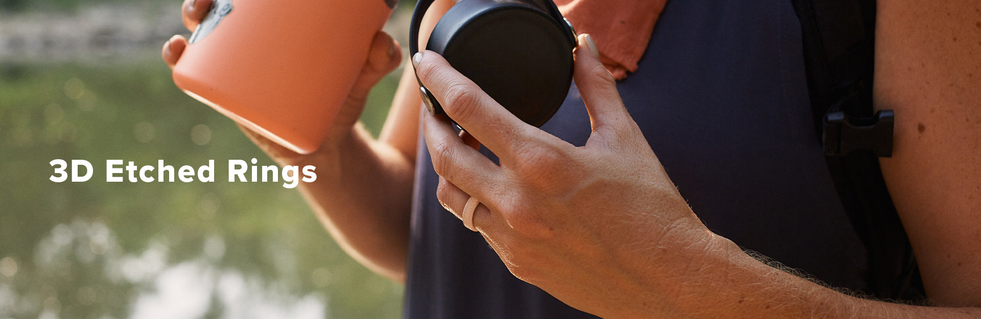 Dimension, a woman packs her camping bag while smiling with trees in the background