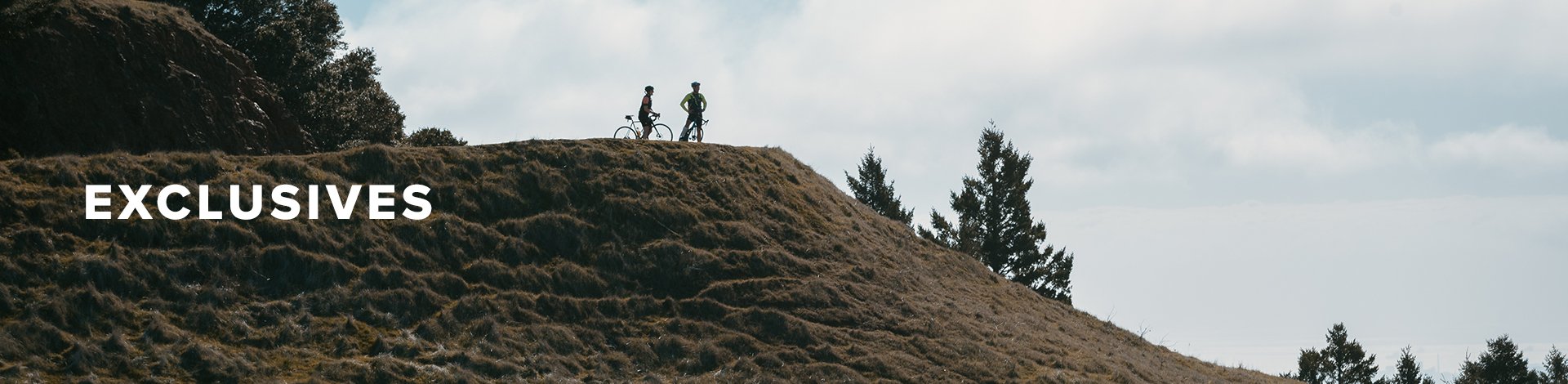 Exclusive, a hunter in camo holds his gun strap over his shoulder