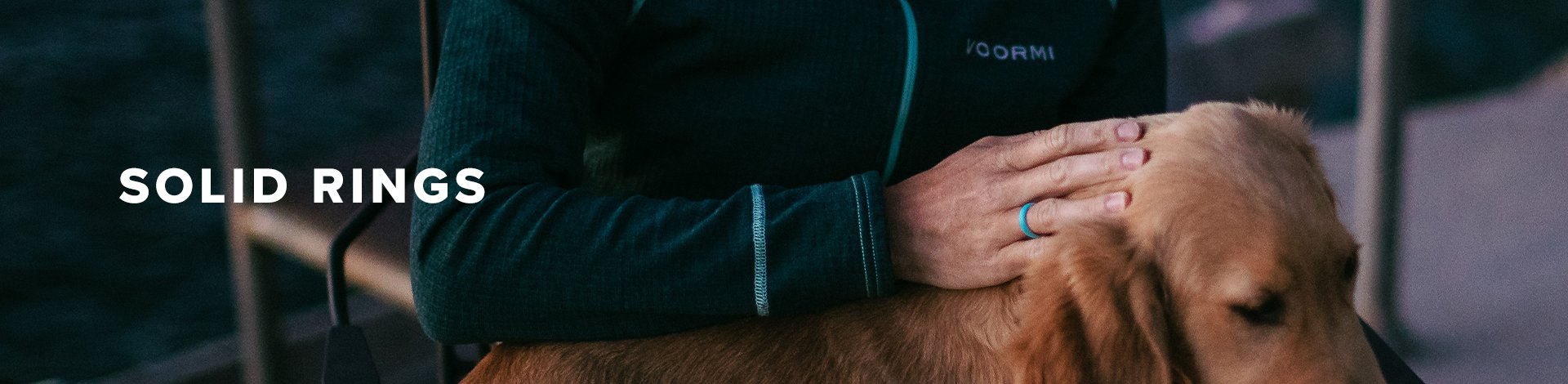 Solid Rings, woman petting a dog in background
