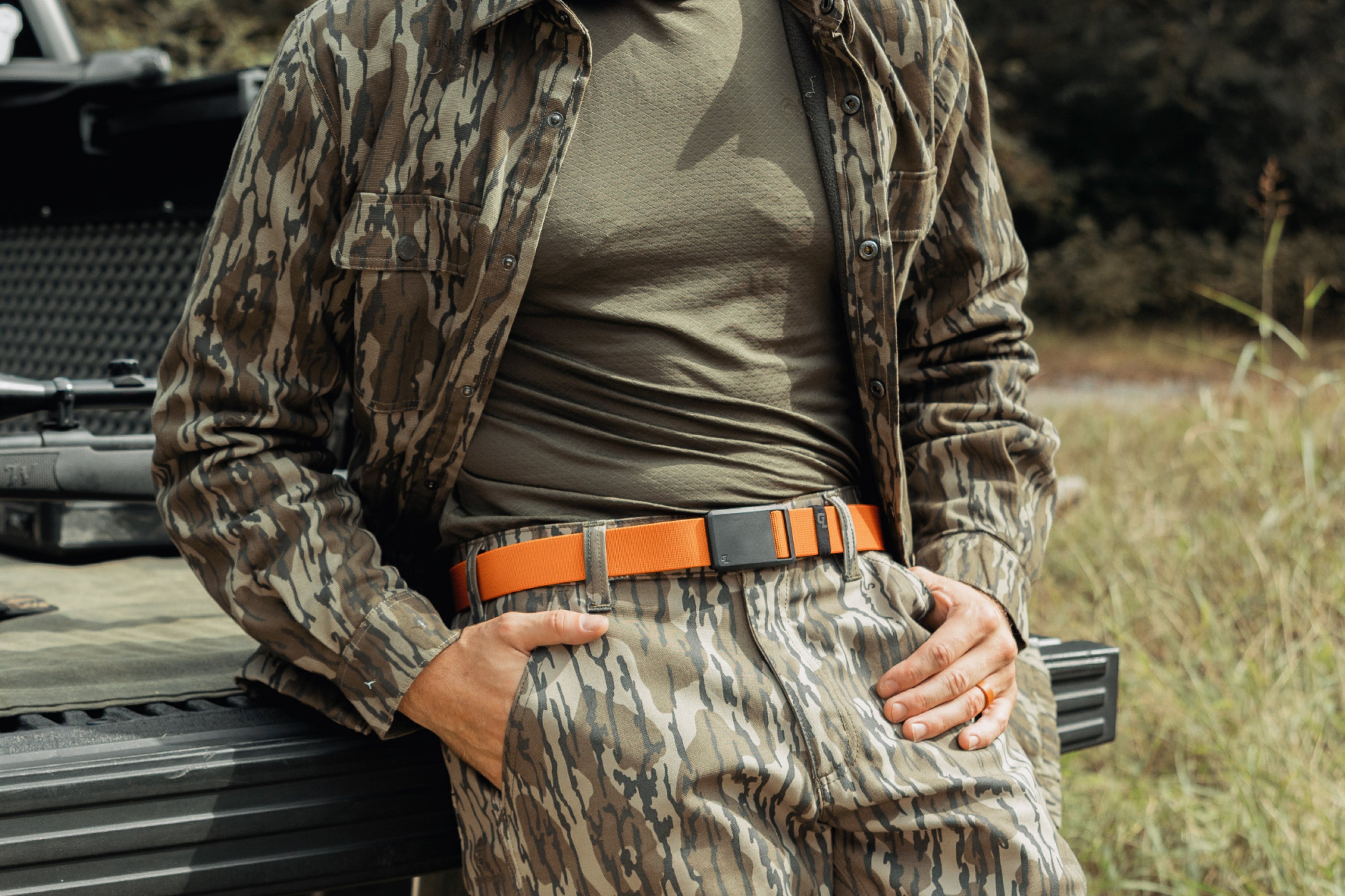 Man Wearing Blaze Orange Ultra Belt