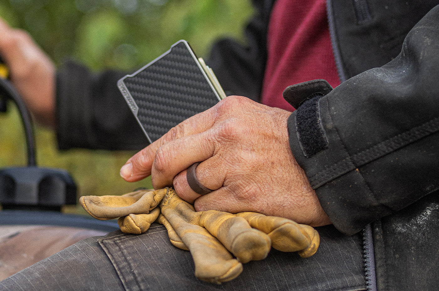 Man holding new Groove Life Carbon Fiber Wallet