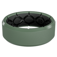 Green ring with black interior on a white background