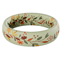 Floral patterned ring on a white background