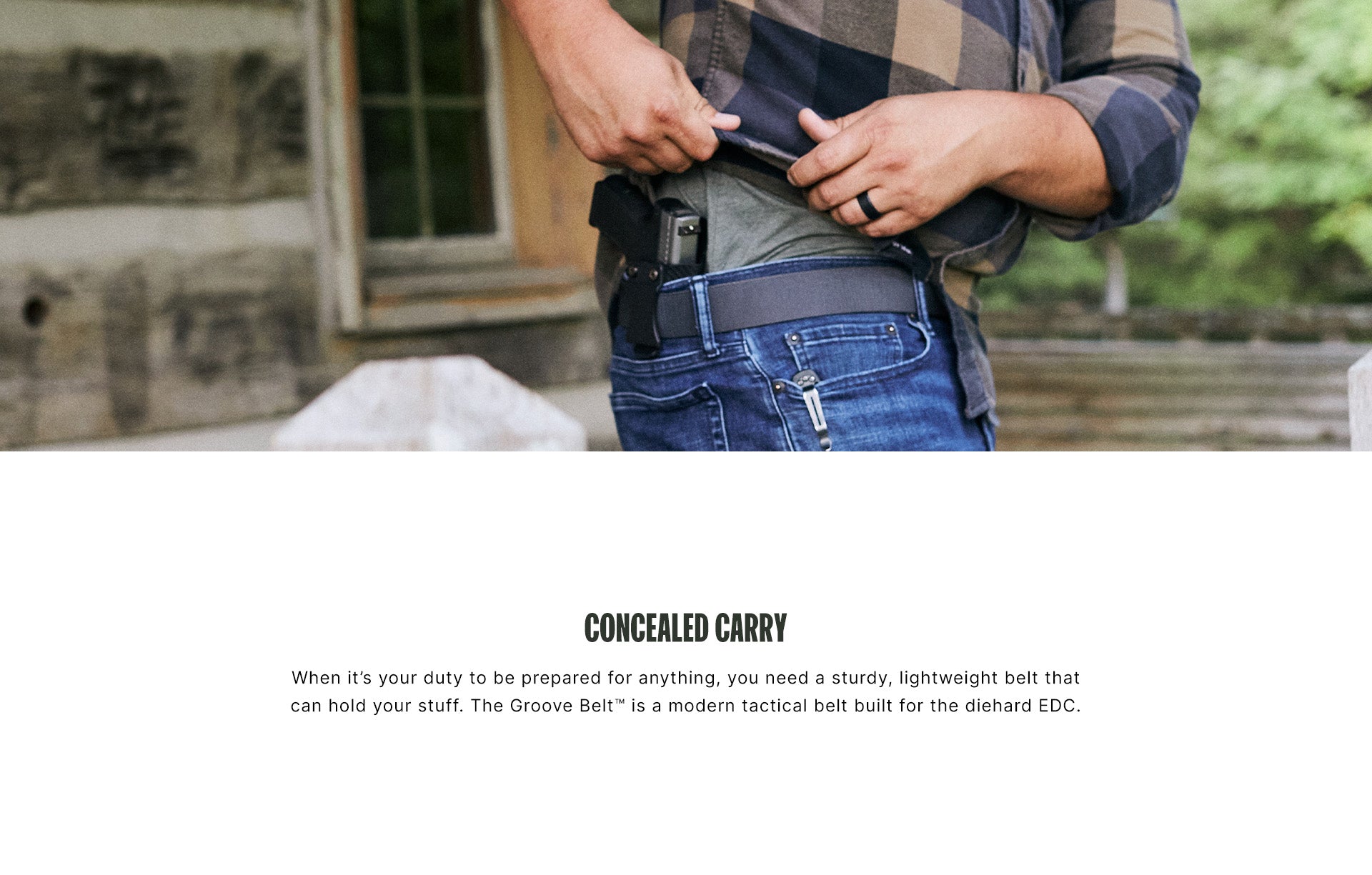 Man using his groove belt to holster his pistol