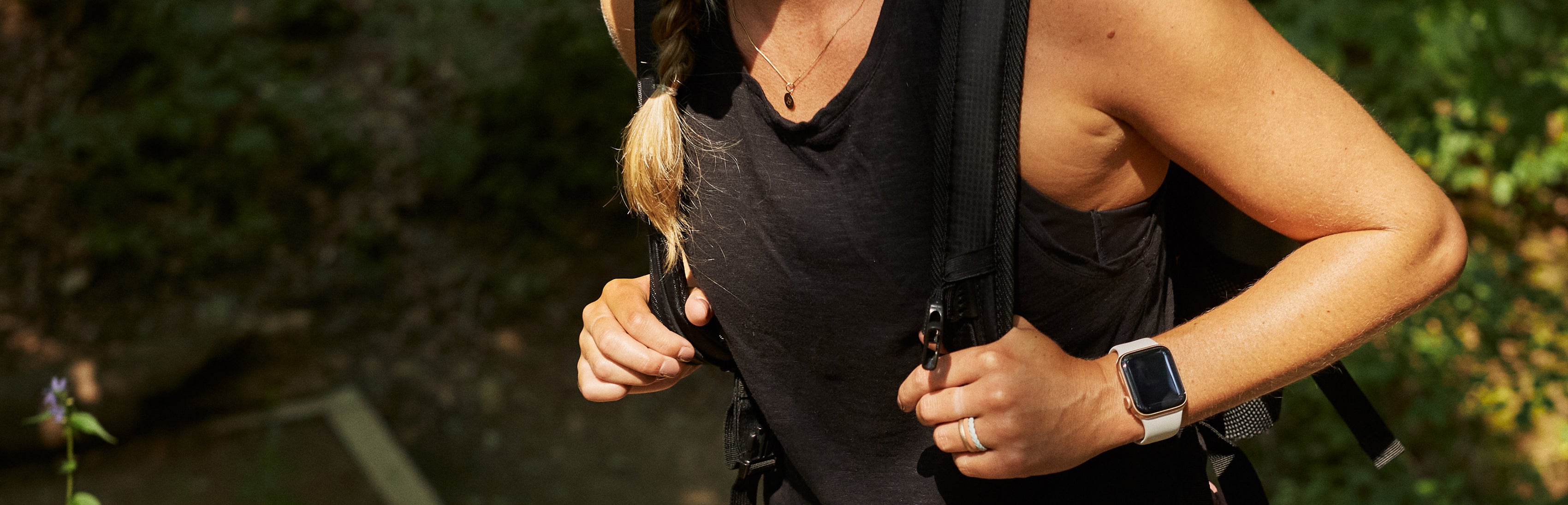 woman hiking wearing a Groove Life watch band