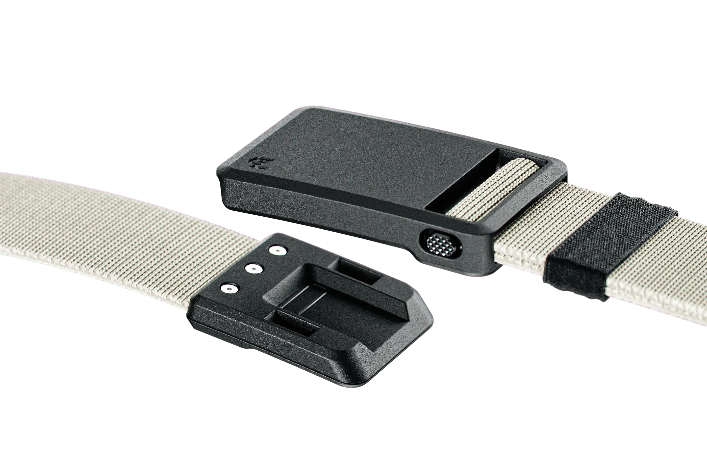 Two black belt buckles with beige straps on a white background
