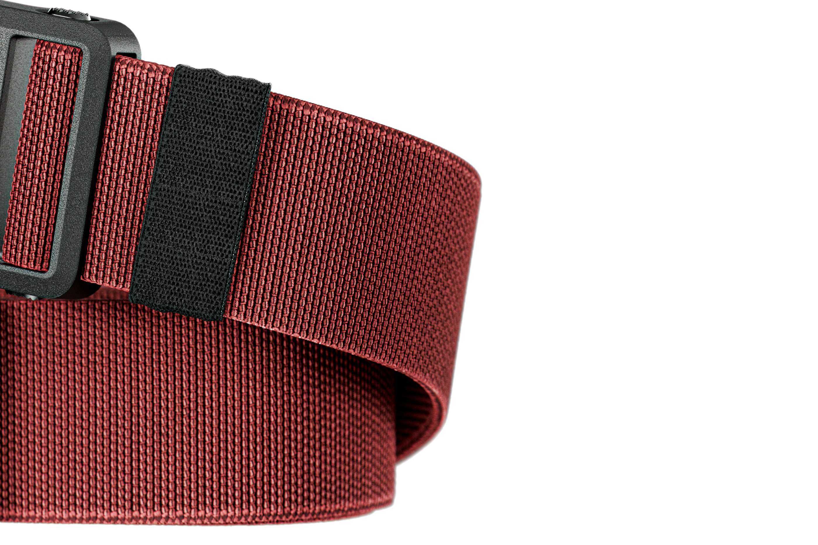 Red belt with a black buckle on a white background