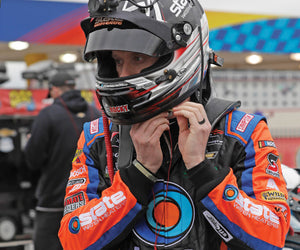 Jeb Burton suits up before a stock car race